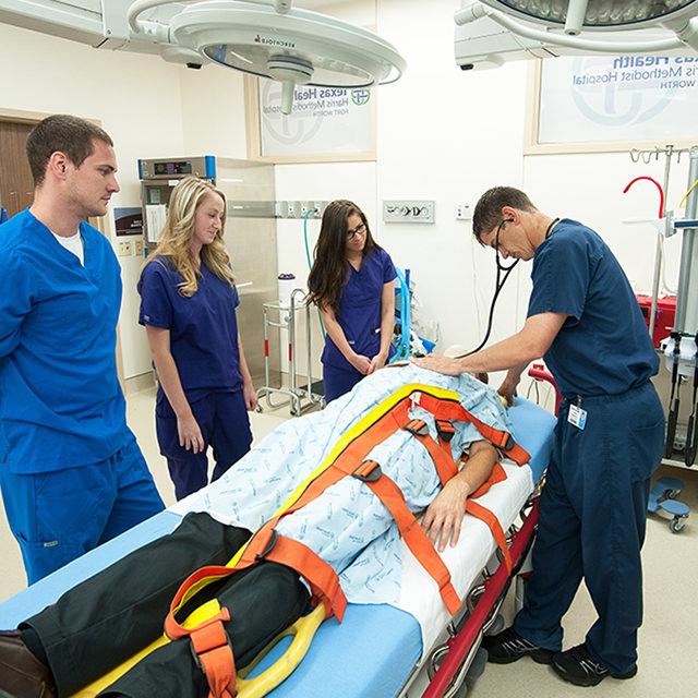 TCU Pre-health students in an emegency simulation